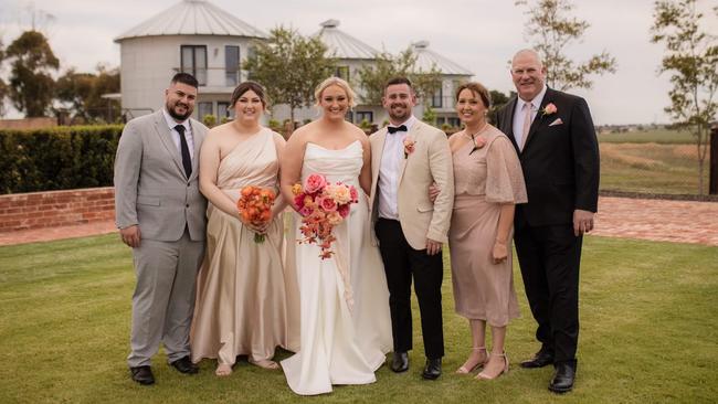 Chelsea O'Neill at her sister's wedding with her partner Zac McDonald, sister Shannon Colbourne, brother-in-law Josh Colbourne, mum Jodie O'Neill and Darren O'Neill. Picture: Supplied