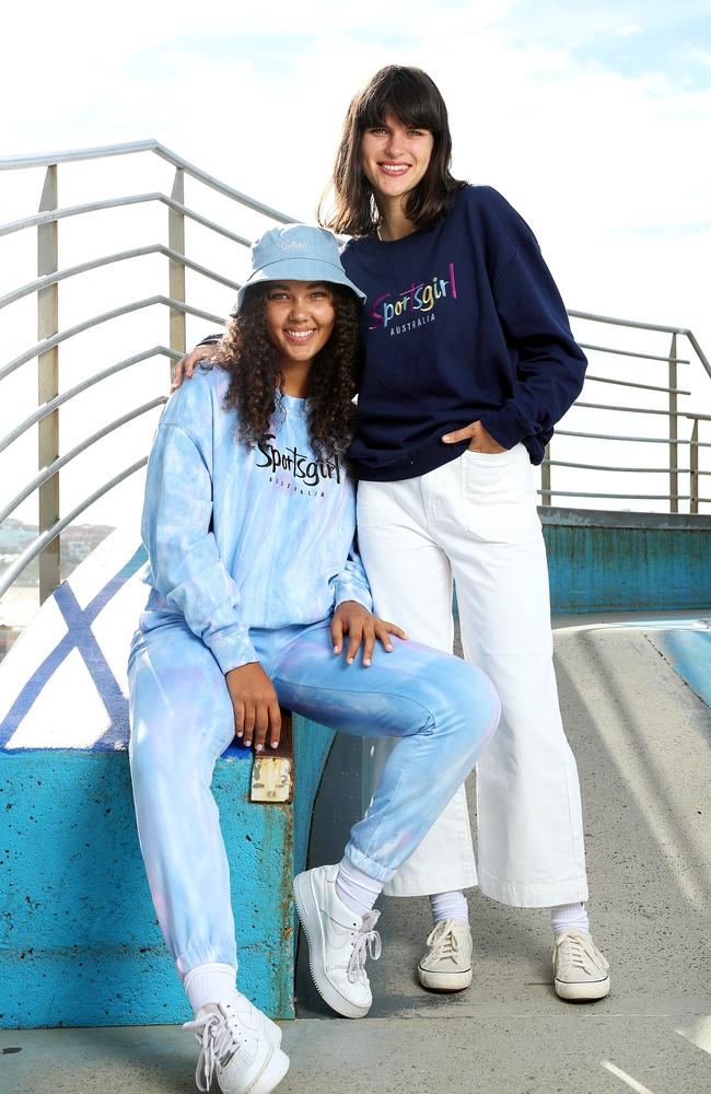 Model Aroha Atkinson and Sabine Jamieson wearing logo-printed items from Sportsgirl at Bondi Beach. Picture: Tim Hunter.