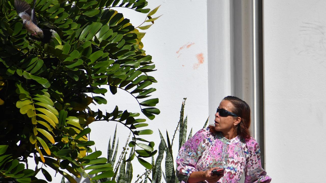 Kerri-Ann Elizabeth Salkeld, 43, is startled by a bird outside the Ingham Magistrates Court. She pleaded guilty to drink driving at Taylors Beach on October 4. Picture: Cameron Bates