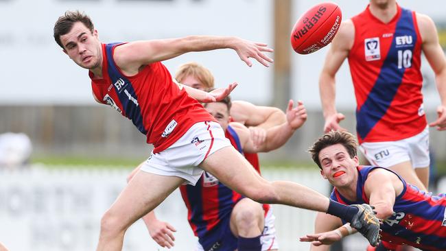 Jack Murphy keeps his eye on the ball for Coburg.