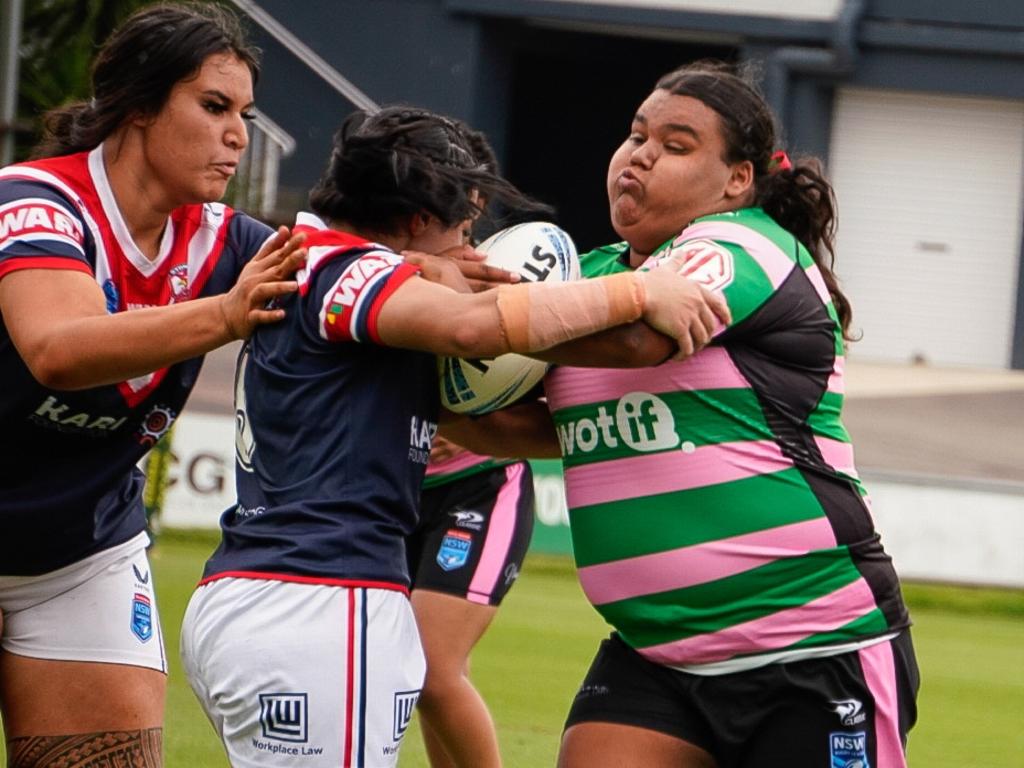 Yilara Widders pushes through a tackle attempt during the Rabbitohs Tarsha Gale Cup clash against the Sydney Roosters. Picture: Nikki Baird