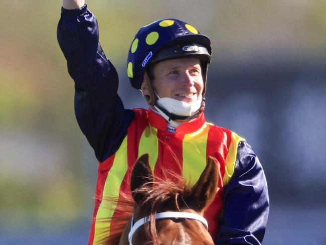 SYDNEY, AUSTRALIA - OCTOBER 16: James McDonald on Nature Strip salutes after winning race 7 The Tab Everest during Everest Day at Royal Randwick Racecourse on October 16, 2021 in Sydney, Australia. (Photo by Mark Evans/Getty Images)