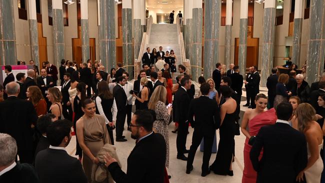 Guests attend the Press Gallery Midwinter Ball at Parliament House in Canberra. Picture: Martin Ollman