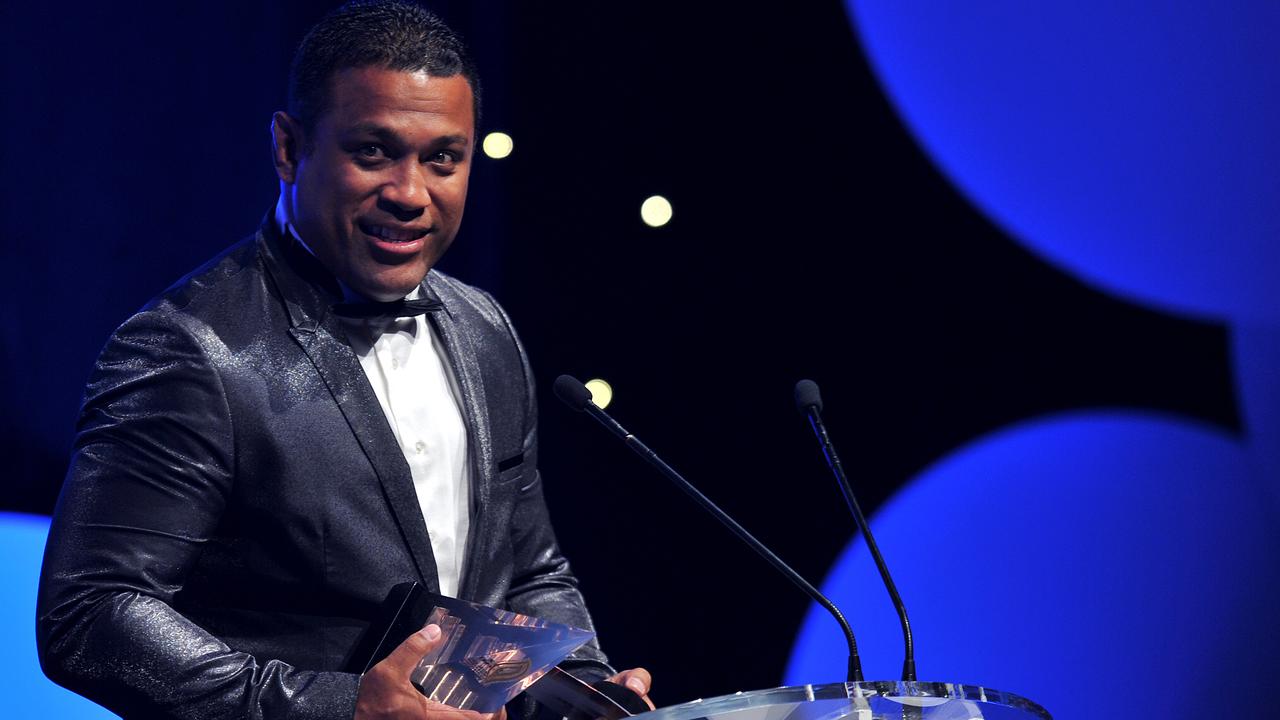 Aaron Fa'aoso accepts the award for Television Show of the Year at the Deadly Awards in 2012. (AAP Image/Paul Miller)