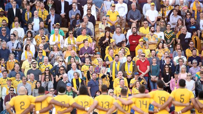 Wallabies supporters in the crowd sing the anthem.