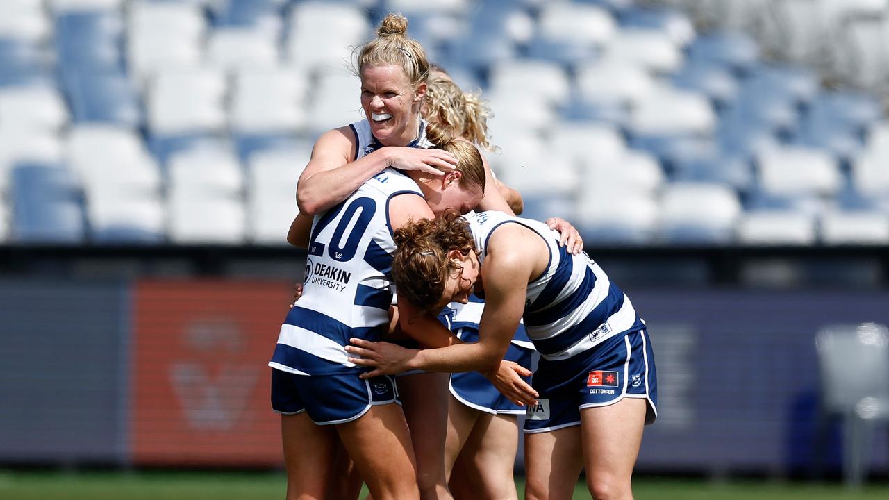 Geelong’s Zali Friswell, Kate Darby and Nina Morrison celebrate the win over the Lions. Picture: Michael Willson/AFL Photos via Getty Images