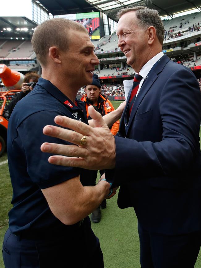 Glen Bartlett, right, and Melbourne agreed on an out-of-court settlement. Picture: Michael Willson/AFL Media