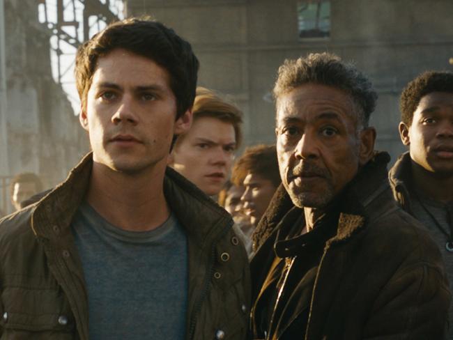 This image released by Twentieth Century Fox shows, foreground from left, Dylan O'Brien, Giancarlo Esposito and Rosa Salazar in a scene from "Maze Runner: The Death Cure." (Twentieth Century Fox via AP)