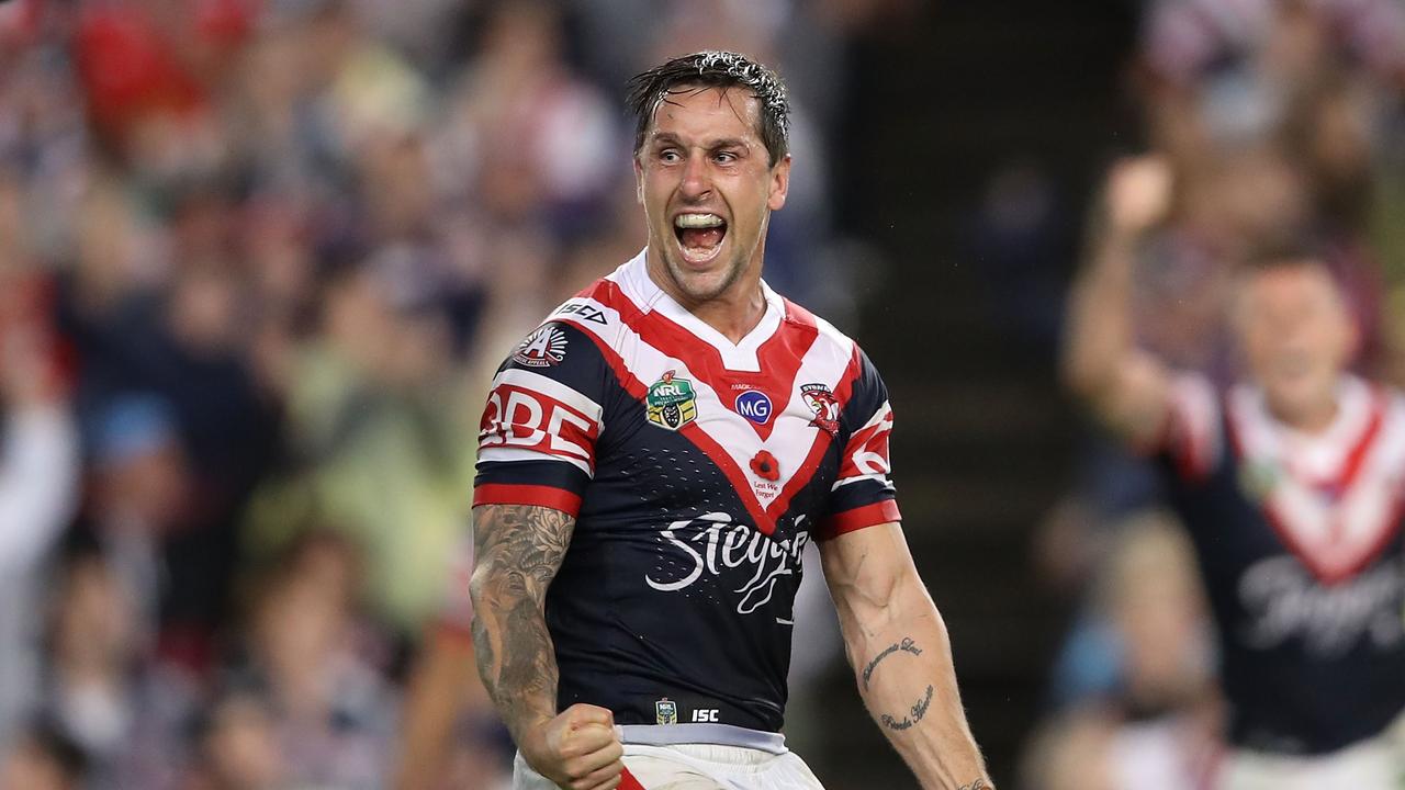SYDNEY, AUSTRALIA - APRIL 25: Mitchell Pearce of the Roosters celebrates kicking a field goal to claim golden point victory during the round eight NRL match between the Sydney Roosters and the St George Illawarra Dragons at Allianz Stadium on April 25, 2017 in Sydney, Australia. (Photo by Mark Kolbe/Getty Images)