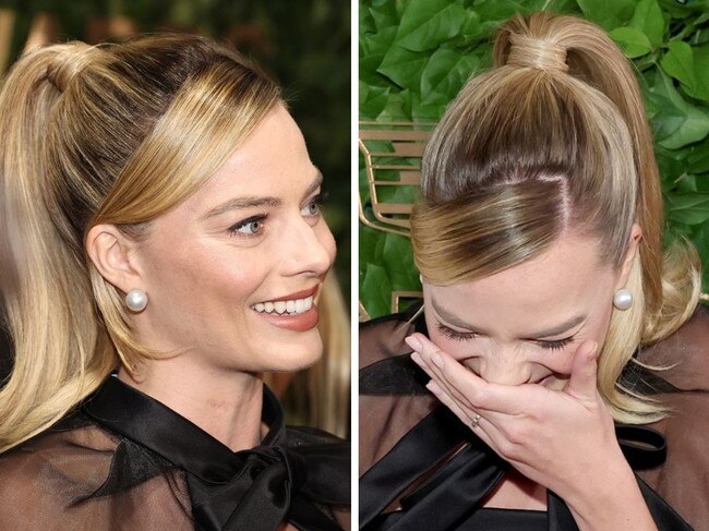 Margot loses it over cheeky red carpet act