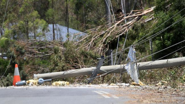 Fallen power lines is making things dangerous for crews to get power back up and running. Picture: NCA NewsWire/ Scott Powick