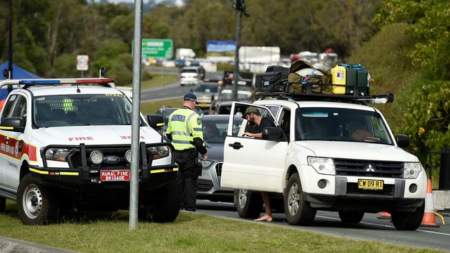 Police checking drivers at a Gold Coast Highway checkpoint (Photo by Matt Roberts/Getty Images)