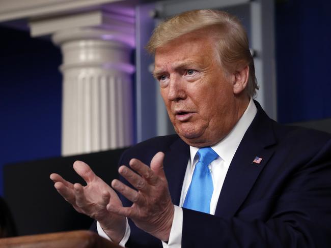 Donald Trump briefs the media in Washington. Picture: AP