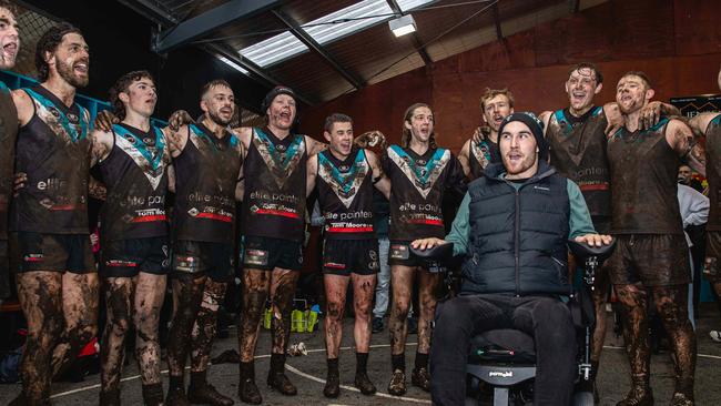 Ryan Wiggins joins his team mates for the first time since his accident to sing the Cygnet Football Club song after a home win. Picture: Linda Higginson