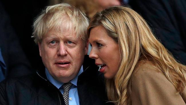 British Prime Minister Boris Johnson, with wife Carrie, may be in hot water again. Picture: AFP