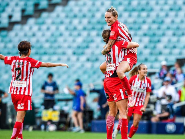 Jessica Fishlock reacts and celebrates after winning the title. Picture: AAP