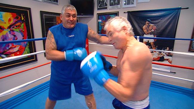 Mick Gatto in the ring with A Current Affair reporter Martin King in 2008.