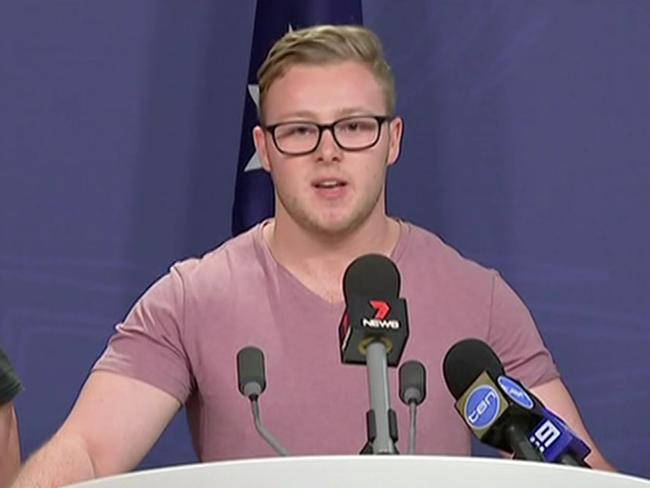 Labor Party supporter and Coles worker Trent Hunter appears with Opposition leader Bill Shorten during a press statement on the Fair Work Commission's ruling on Penalty Rates for Australian workers.
