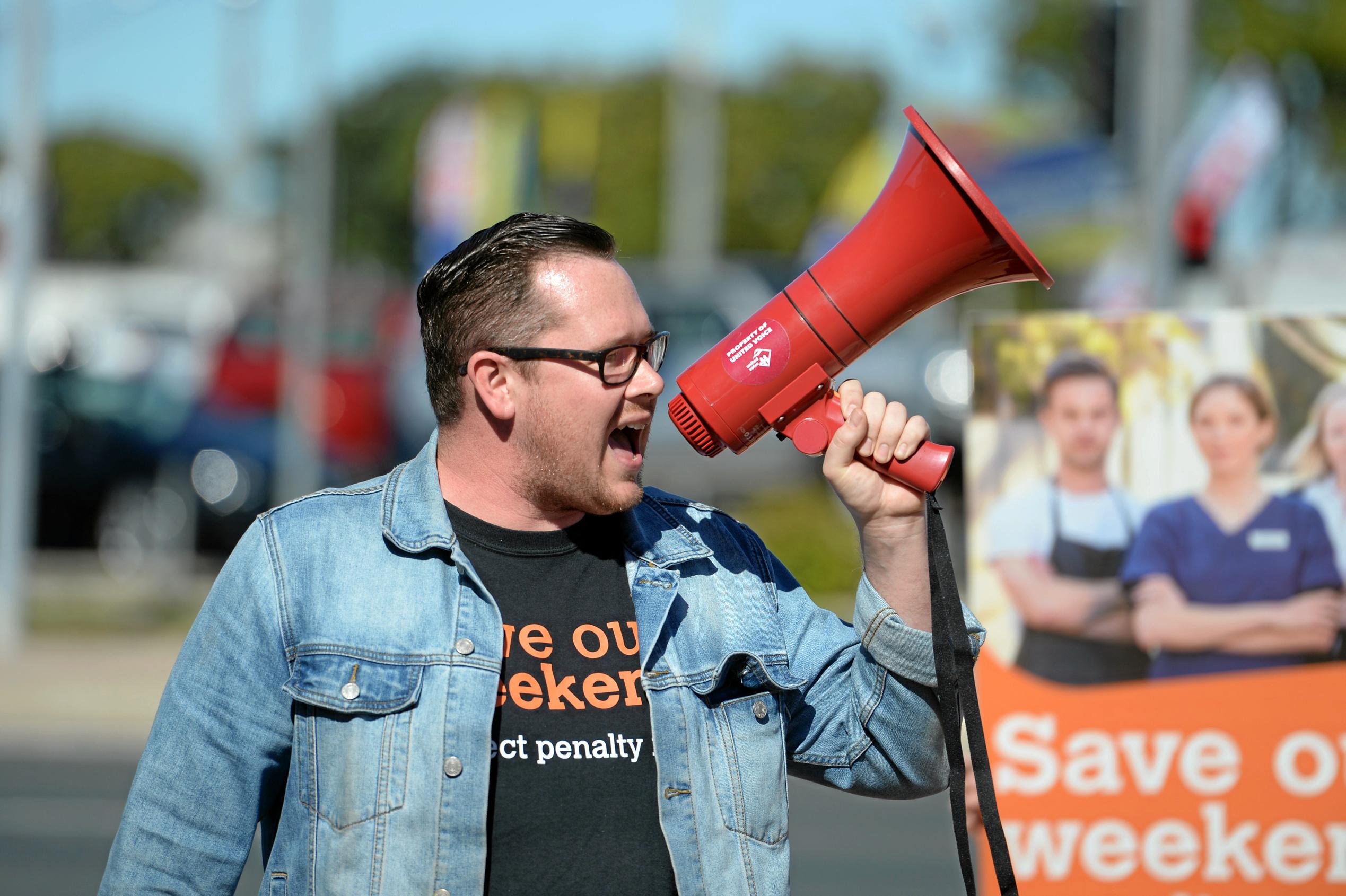 United Voice protesting for penalty rates at MP for Dawson George Christensen office in Mackay. Picture: Stuart Quinn