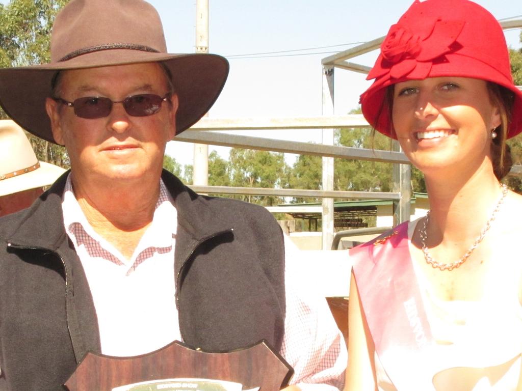 Jack Krause of Eidsvold Sleeper Mill was the most successful exhibitor of prime cattle at last year's Eidsvold show. His trophy was presented by 2012 Showgirl Alexis Hindmarsh. Photo Sue Harris / Central &amp; North Burnett Times