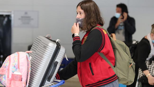 Travellers arrive in Brisbane airport from Melbourne ahead of lockdown. Picture: Liam Kidston