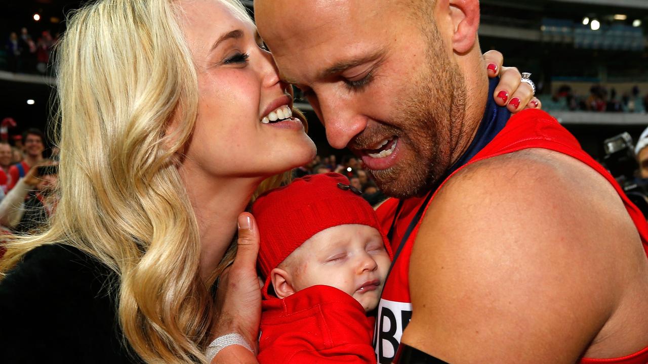 Jarrad McVeigh with wife Clementine and daughter Lolita after the 2012 Grand Final. Photo: Michael Willson/AFL Media