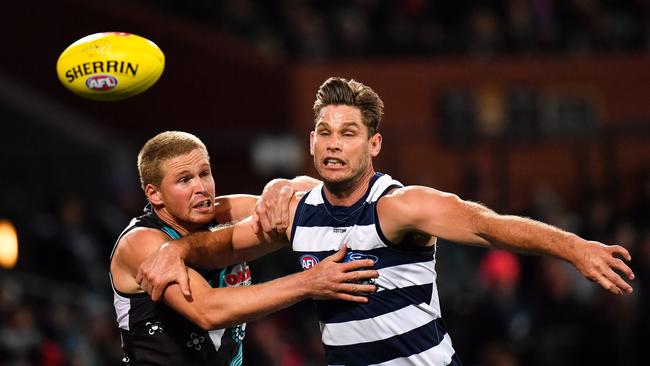 Tom Clurey added to his list of big scalps on Saturday by keeping Tom Hawkins goalless. Picture: Daniel Kalisz/Getty Images