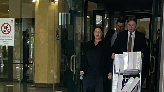 Helen Elizabeth Jacobs leaves Downing Centre Local Court on the first day of the hearing.