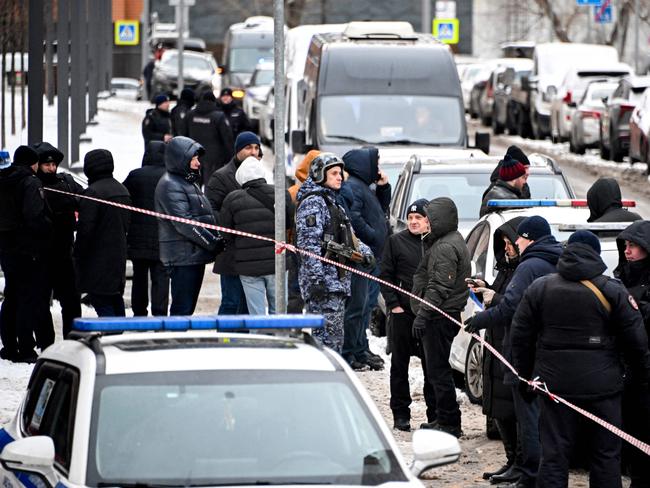 The Russian Investigative Committee at the scene on Ryazansky Ave in Moscow. Picture: AFP