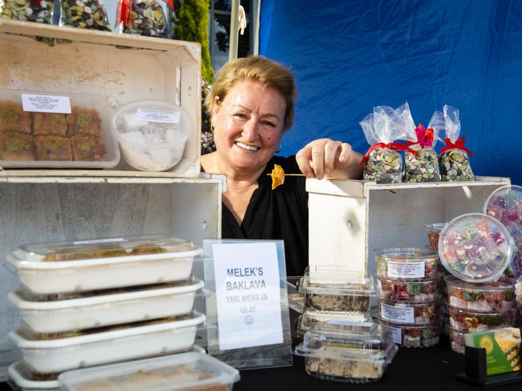 Melek Onugoren boasts she has the best baklava in Queensland at her Melek's Baklava and More stall at Locals 4 Locals summer edition on the lawn of Empire Theatres, Friday, February 18, 2022. Picture: Kevin Farmer