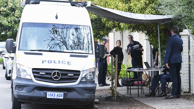 Police, detectives and forensics at the Gilberton home of intensive care pediatrician Dr Michael Yung. Picture: NCA NewsWire / Mark Brake