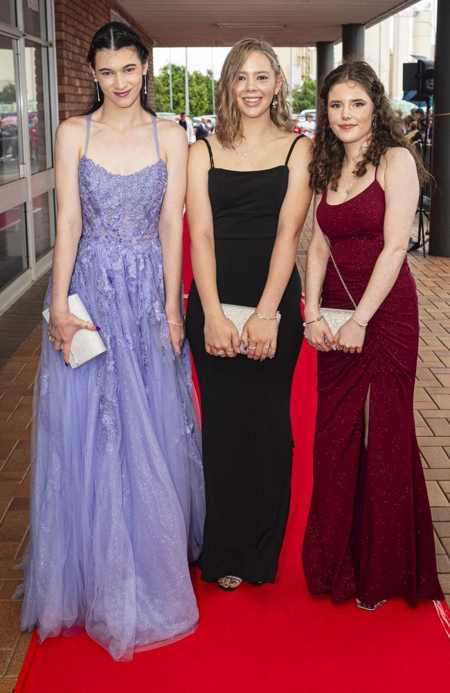At St Joseph's College Inauguration Ball are (from left) Sarah Douglas, Isabella-Rose Upton and Charlotte Brown. Picture: Kevin Farmer