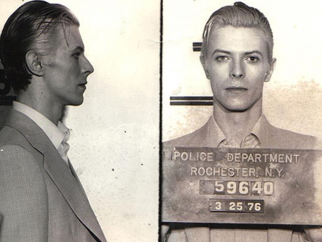 Arrested with friends for marijuana possession in Rochester, New York, music legend <b>David Bowie</b> posed in 1976 for what has been described as the coolest mugshot of all time. Looking dapper in his three-piece suit, he insisted he was innocent but had no complaint about his treatment, saying the police acted “like gentlemen” and were “very courteous.” Charges were later dismissed. Picture: Getty