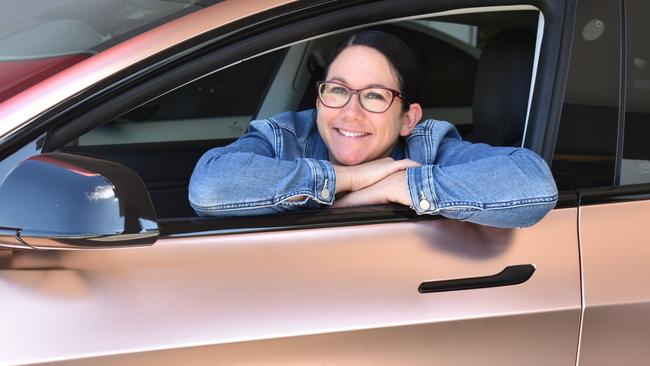 Micky Hasted and her husband bought an electric car last year and say it's zippy, low-maintenance and quick to charge. Photo: Ebony Graveur