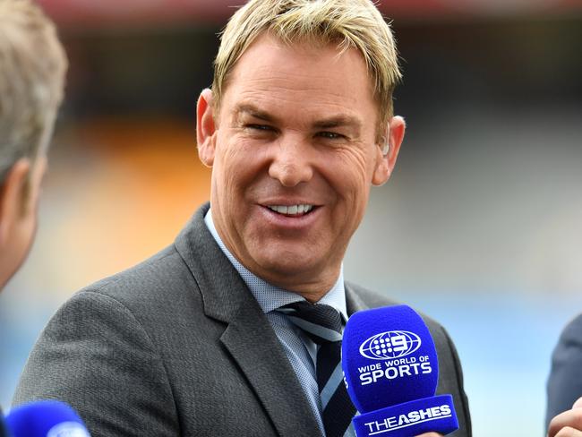 Former Australian player Shane Warne is seen commentating for Australian TV on Day 1 of the First Test match between Australia and England at the Gabba in Brisbane, Thursday, November 23, 2017. (AAP Image/Darren England) NO ARCHIVING, EDITORIAL USE ONLY, IMAGES TO BE USED FOR NEWS REPORTING PURPOSES ONLY, NO COMMERCIAL USE WHATSOEVER, NO USE IN BOOKS WITHOUT PRIOR WRITTEN CONSENT FROM AAP