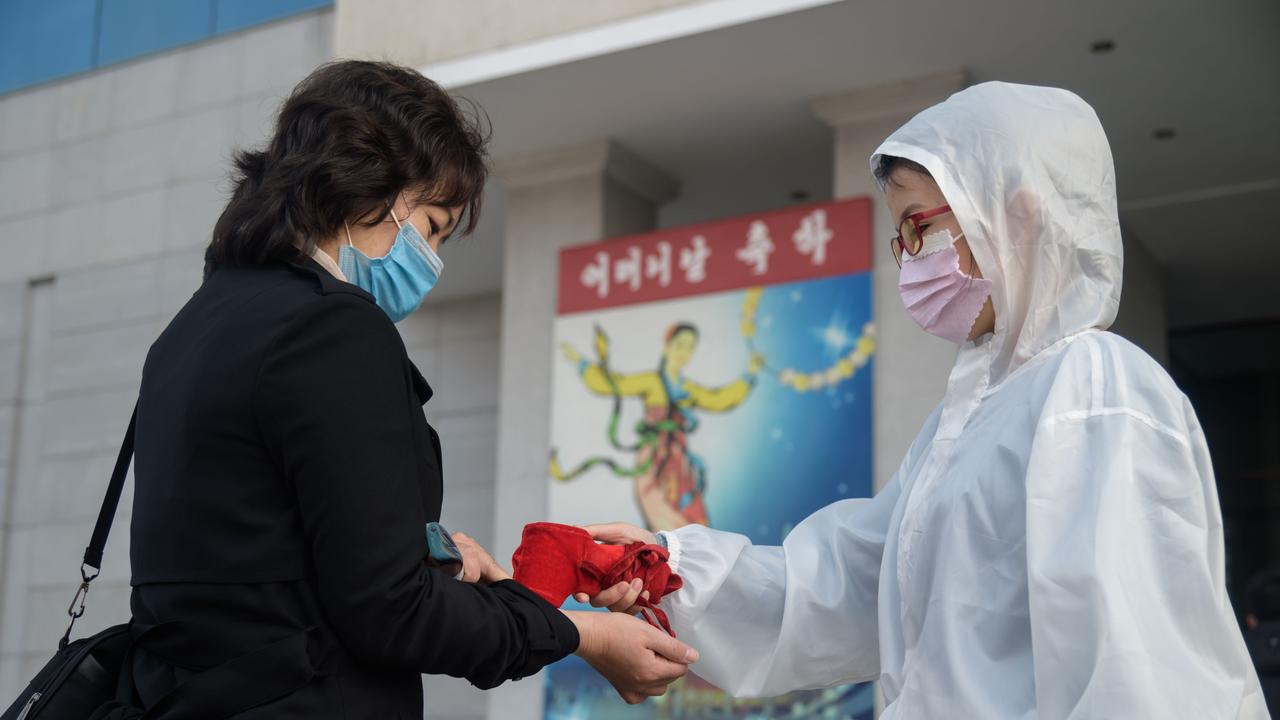 A health workers conducts a check as part of preventive measures against COVID-19 in North Korea. Picture: Kim Won Jin/AFP