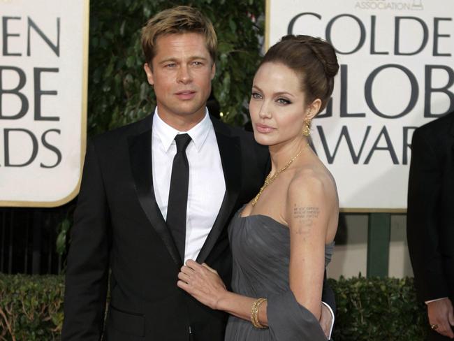 FILE - In this Jan. 15, 2007, file photo, actor Brad Pitt and actress Angelina Jolie arrive for the 64th Annual Golden Globe Awards in Beverly Hills, Calif. A Los Angeles judge on Wednesday, Dec. 7, 2016, refused to seal details about a custody dispute between Pitt and Jolie Pitt after the actor sought an emergency order to seal details in the case. Jolie Pitt filed for divorce in September and has physical custody of the former couple's six children until a final custody agreement is reached. (AP Photo/Mark J. Terrill, File)