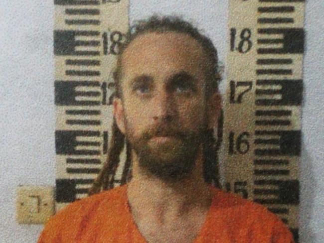 BALI 9 SEPT 2016 - Mugshot of David Taylor inside the dossier that was handed over by police to the Prosecutor in Denpasar, Bali. David Taylor and his girlfriend Sara Connor are accused of murdering a policeman on Kuta Beach. Picture: Supplied