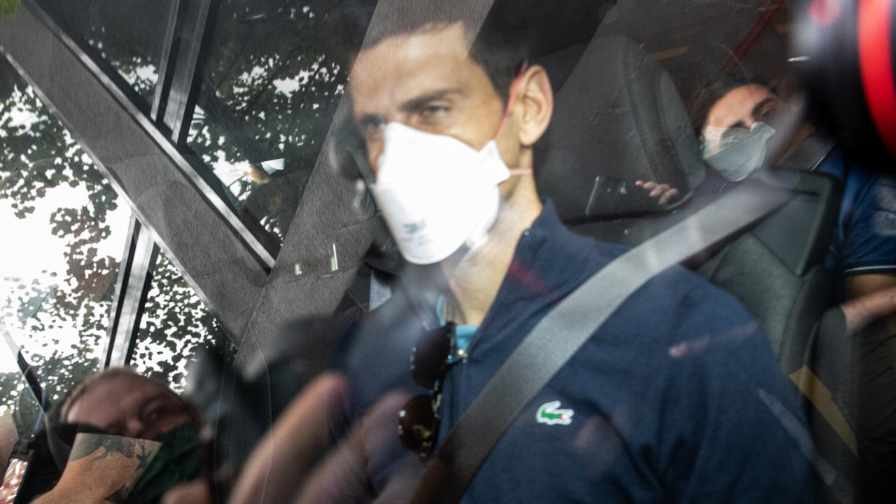 Novak Djokovic leaving the Park Hotel in 2022 after his visa was cancelled by the Australian government. Picture: Getty Images