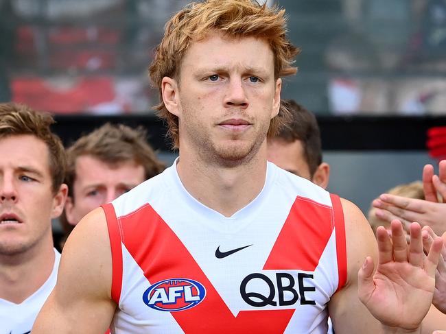 MELBOURNE, AUSTRALIA - MAY 07: Callum Mills of the Swans leads his team out onto the field during the round eight AFL match between Collingwood Magpies and Sydney Swans at Melbourne Cricket Ground, on May 07, 2023, in Melbourne, Australia. (Photo by Quinn Rooney/Getty Images)