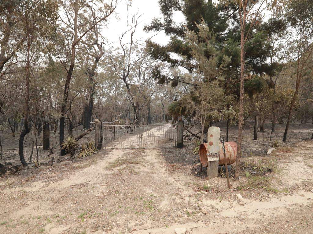 The charred entrance of a property at Deepwater. Picture: Mark Cranitch