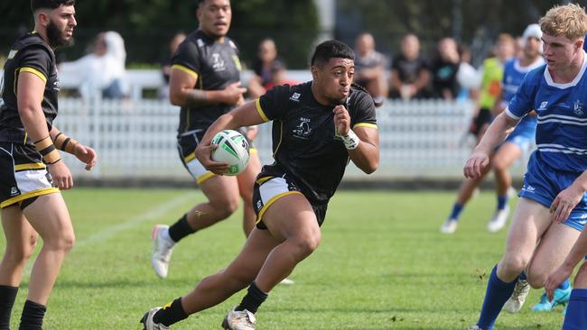 Action between St Dominic's College and Bass High School in round one of the Peter Mulholland Cup at Ringrose Park. Picture: Tim Hunter