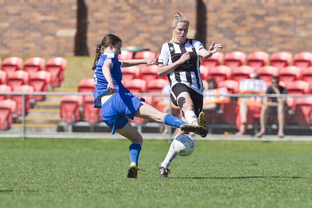 Jaime Andison (left) for Rockville and Chantal Frohloff for Willowburn in Toowoomba Football League Premier Women grand final at Clive Berghofer Stadium, Sunday, September 9, 2018. Picture: Kevin Farmer