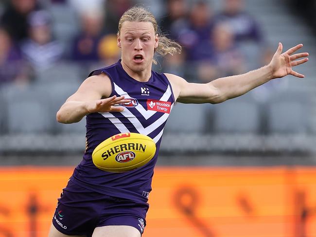 Hayden Young sends the Dockers forward. Picture: Paul Kane/Getty Images