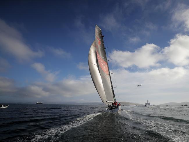 Wild Oats XI skippered by Mark Richards sails up the River Derwent on her way to a 9th line honours victory in the 2018 Sydney to Hobart Yacht Race. The yacht crossed the line in 1d 19hrs 7mins 21secs . Picture: RICHARD JUPE