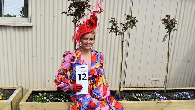 Hamilton Cup Races 2022 - Fashions on the Field entrant portraying her unique millinery headpiece.