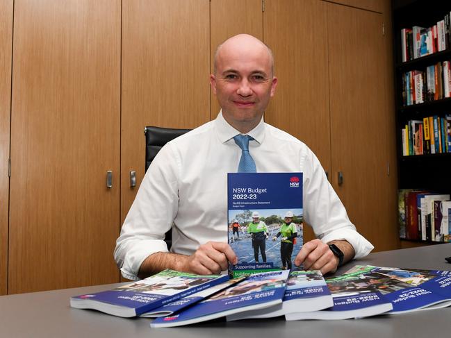 NSW Treasurer Matt Kean with his first budget, printed on Monday ahead of its Tuesday release. Picture: AAP Image/Bianca De Marchi