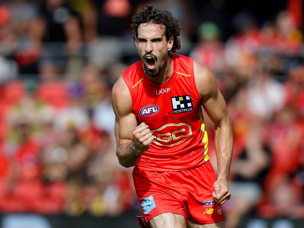 Ben King of the Suns celebrates a goal during the Opening Round match against new coach Damien Hardwick’s old side. Picture: Russell Freeman/AFL Photos via Getty Images.