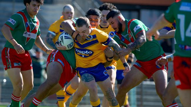 Curtis Faughlin taking on Corrimal. Picture: Thomas Lisson