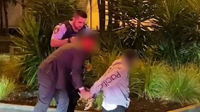NSW Police Force branded vision of the arrest of a 37-year-old man at Huntingwood and a 43-year-old man at Mascot Police Station, the men were arrested over 2009 murder of Omega Ruston – Photo NSW Police